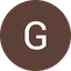 White letter G on a solid brown circular background.