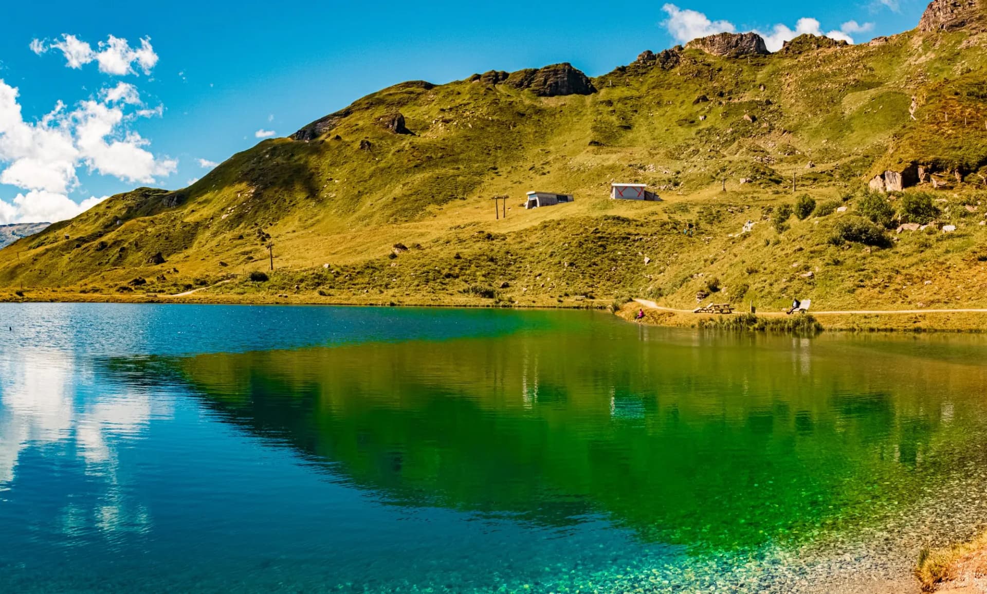 High resolution stitched alpine summer panorama with reflections at Schlossalmbahn cable car, Mount Kleine Scharte, Bad Hofgastein, St. Johann im Pongau, Salzburg, Austria