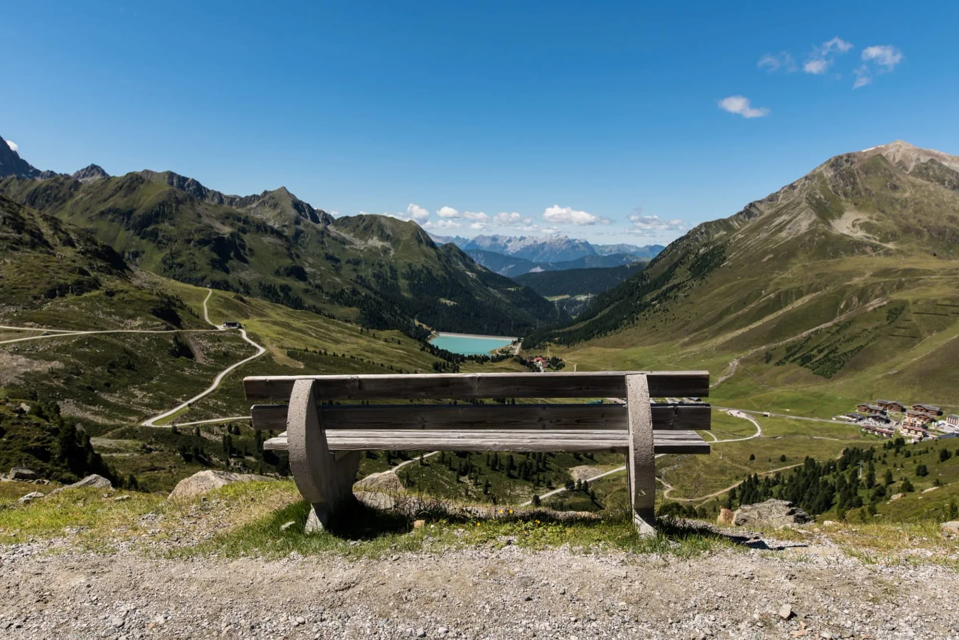 Lonely bench over the valley in the mountains of Kühtai Tyrol